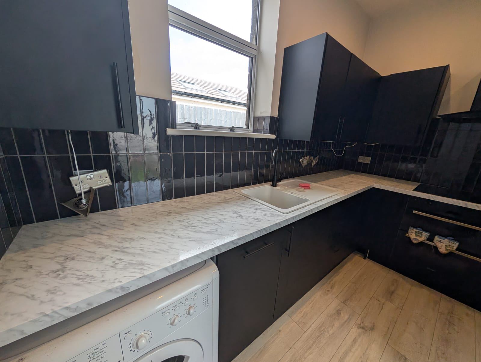 Vertical Black Tile Kitchen Splashback, Motherwell